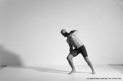 Underwear Gymnastic poses Man Black Muscular Bald Dancing Dynamic poses Academic